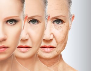 Three pictures of a woman's face aging