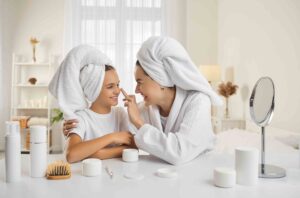 Mother,And,Child,Having,Fun,During,Skin,Care,Routine.,Happy